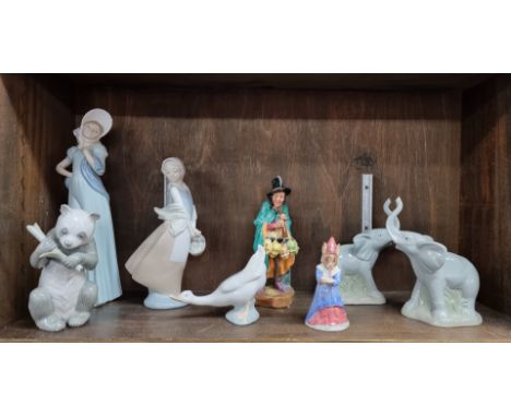 A small collection of Nao, Royal Doulton and other ceramic figures,&nbsp;largest 32cm high. 
