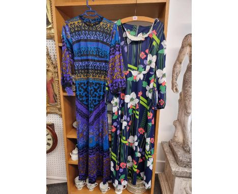 Two vintage ladies dresses,&nbsp;one labelled 'Alexander Clare'; together with three other old dresses; and a vintage Girl Gu