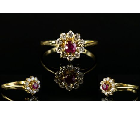 18ct Gold Ruby and CZ Set Cluster Ring. Flower head Setting. The Central Ruby Surrounded by 10 Diamonds. Ring Size - M. Excel