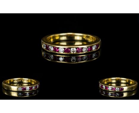 18ct Gold - Nice Quality Ruby and Diamond Channel Set Ring. The Rubies and Diamonds of Excellent Colour and Clarity. Fully Ha