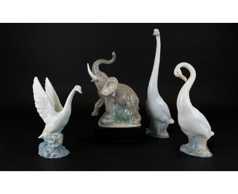 Nao by Lladro Collection of Porcelain Elephant and Bird Figures ( 4 ) In Total. Tallest Figure 13.5 Inches High, Elephant Fig