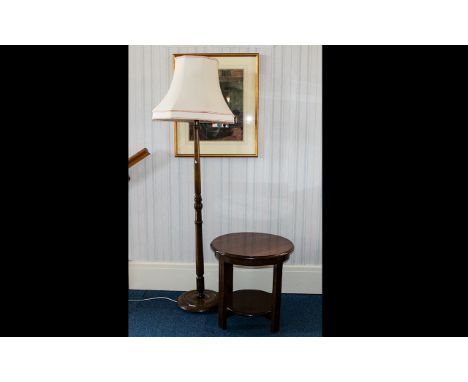 Oak Occasional Table. Circular table with circular bottom shelf. Circa 1930's of typical form. Height 20 inches and diameter 