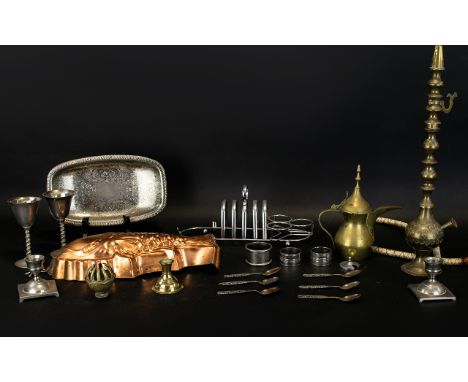 A Collection Of Mixed Metalware Approximately twelve items in total to include, brass hookah, oil vessel, copper fish shaped 