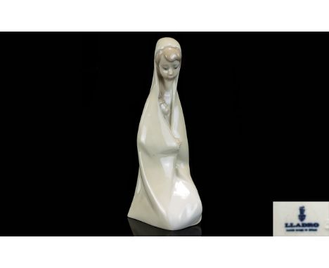 Lladro Figure, model no 4636 Girl with Child Madonna, 6.75 in height.