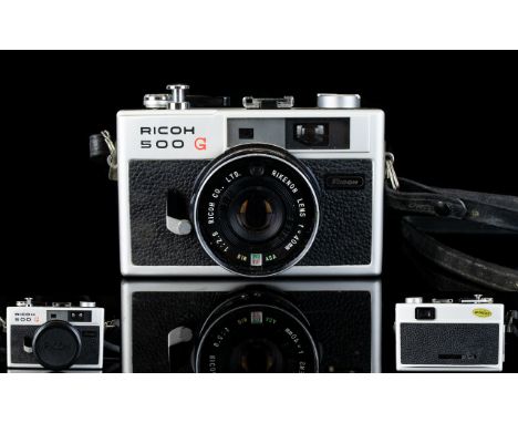 Ricoh 500g (1972) 35mm Film Range Finder Camera with excellent high contrast F.2.8 Rikenon Lens. Made in 1972 with leather st