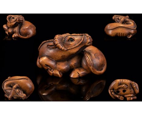Japanese - 19th Century Superb Carved Boxwood Signed Netsuke. Depicts a Japanese Oxon In a Resting Position. Signed to Unders