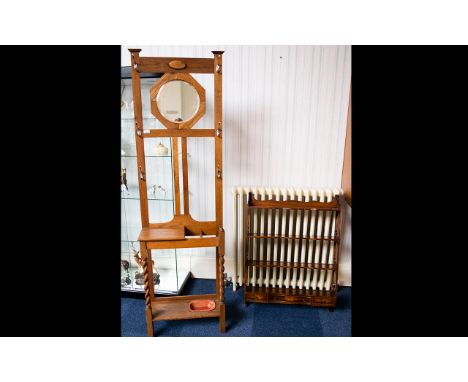 Early 20th Century Hall Stand of plain form, central bevelled glass mirror, turned supports. Original tin drip tray to base. 