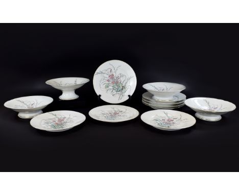 A Set of Decorative Ceramic Table Ware (12) items in total. To include four footed bowls and eight serving plates, each on wh