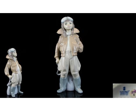 Lladro Porcelain Figure ' Little Pilot ' Model Num 6451. Sculpture - Francisco Catala. Issued 1997 - 2002. Height 9.5 Inches.