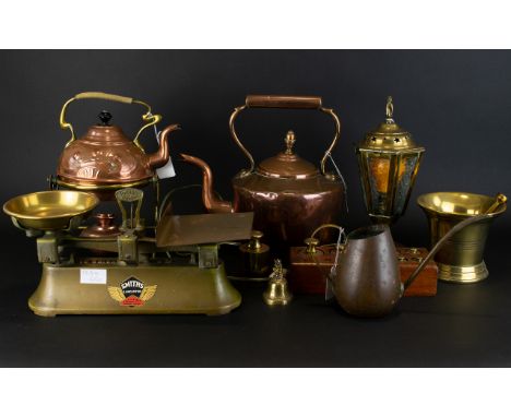 A Collection Of Mixed Metal Vintage Kitchen Items Ten in total to include, copper spirit kettle, brass scale with accompanyin