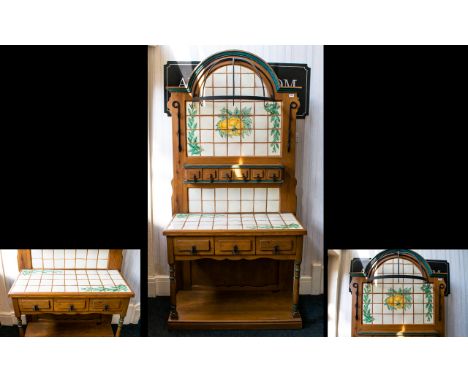 Rustic Pine Wash Stand with glazed tiled inlay to top and back of stand. In fruit and foliate design, Three drawers to the fr