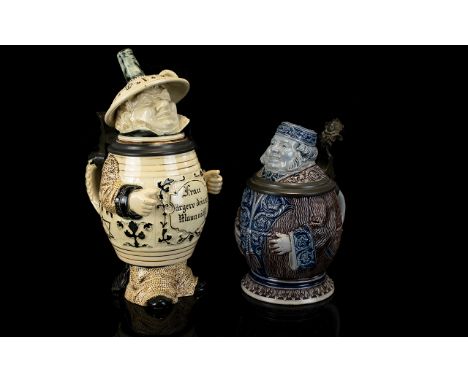 Antique German Figurative Beer Steins Two in total, each circa 1900. The first by Reinhold Hanke, Hohr-Grenzhausen, Germany, 