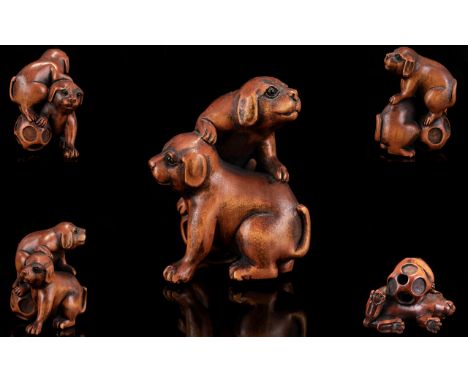 Japanese - Early 20th Century Superb Quality Carved Boxwood Netsuke. Depicts Two Puppies at Play with Large Ball - Please See
