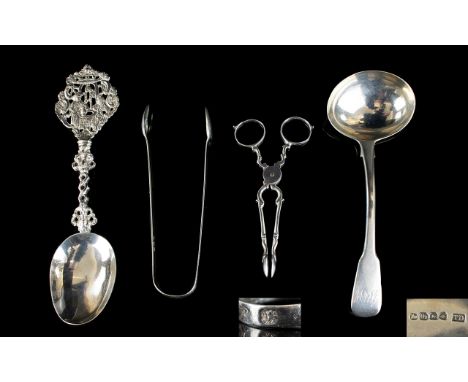 A Collection of Antique Silver Items (4) in total. Comprises 1. George IIII Silver Ladle, hallmark London 1821 60.6 grams. 2.