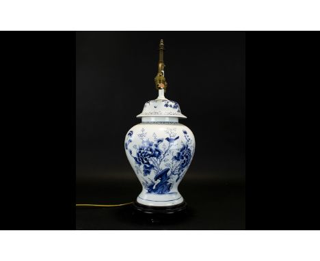 Oriental Style Ceramic Lamp Base Of urn form with traditional hand painted Delft style floral and foliate design, raised on f