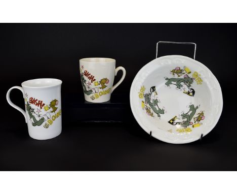 Tom and Jerry Interest. 2 Tom and Jerry Ceramic Cups together with a Total Elegance Staffordshire Tom and Jerry Bowl. ( 3 ) I