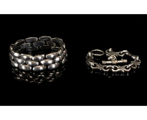 Two Contemporary Silver Bracelets Chunky statement bracelets, each stamped 925 silver. The first comprising exaggerated brick