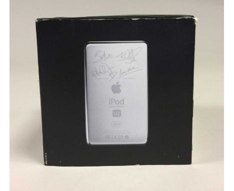 U2 SPECIAL EDITION iPOD. A unused special edition U2 iPod 20GB, still in original box with all inserts including fold out pos