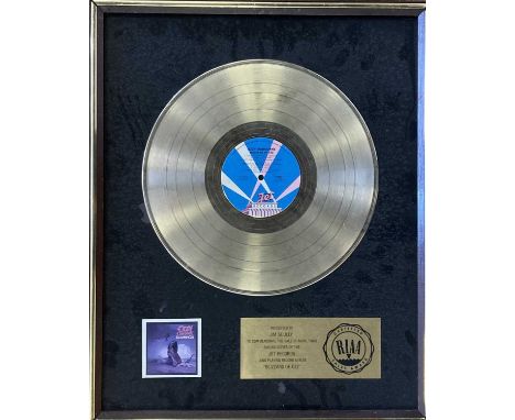 OZZY OSBOURNE RIAA GOLD DISC AWARD. An original framed US gold disc RIAA presentation award, presented to Jim Scully in recog
