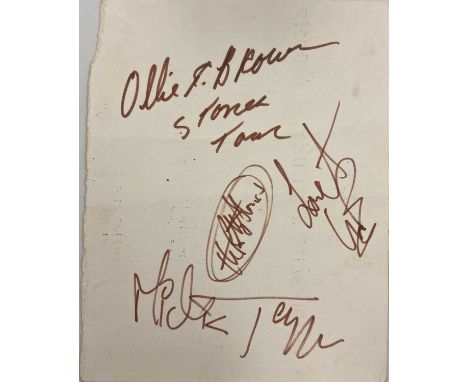 ROLLING STONES AUTOGRAPHS. A scrap of a menu bearing signatures from Mick Jagger, Charlie Watts and Ollie Brown. Measures 10 