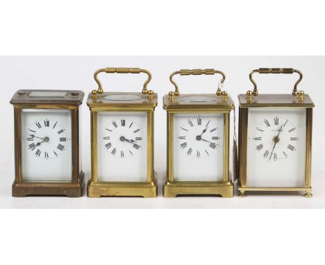 Early 20th century French lacquered brass carriage clock, having visible platform escapement, h.11.5cm; together with two oth