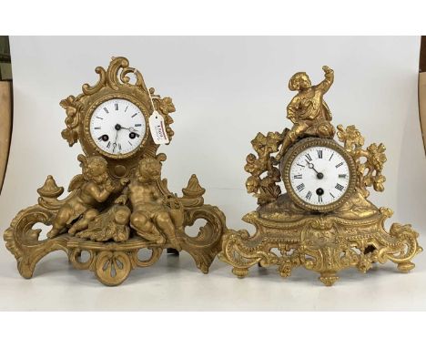 A late 19th century French gilt metal mantel clock, the case adorned with twin cherubs having white enamel dial and 8-day bra