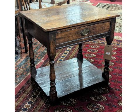 A contemporary joined oak low single drawer two-tier side table, width 59.5cm 