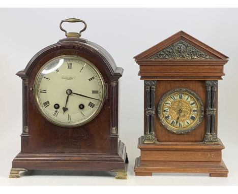 A George V mahogany bracket clock in the Georgian style, having white enamel dial and eight-day spring-driven movement striki