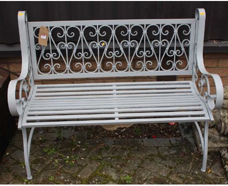 A grey painted metal two-seater garden bench, having floral scroll and strapwork design, width 117cm