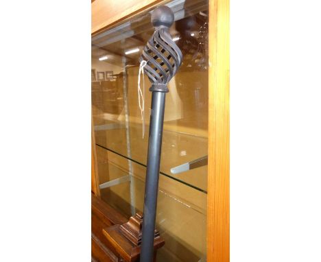 A contemporary metal curtain pole by Jim Lawrence, with twin cage and ball tie-backs, and two further fixing brackets, length