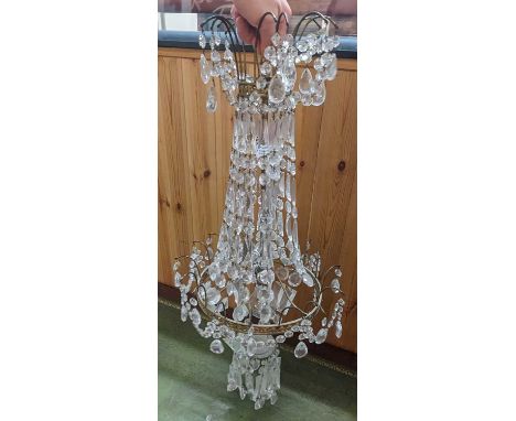 A gilt brass and cut crystal glass tent and bag hanging ceiling light