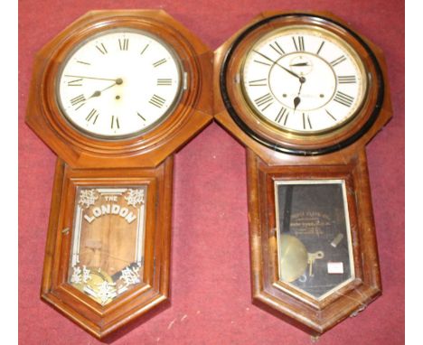 An early 20th century Ansonia of New York drop trunk wall clock having spring driven movement, 81cm, together with one other 