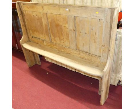 A rustic joined and panelled pine bench settle, of narrow profile, length 158cm 