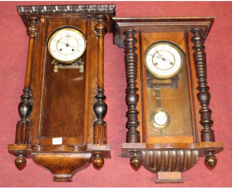 An early 20th century walnut cased Vienna drop trunk wall clock having spring driven movement, 57cm (lacking pediment), toget