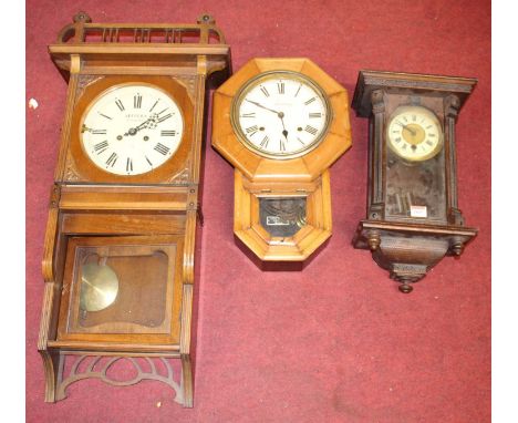 An Ansonia soft wood cased drop trunk wall clock, 47cm, together with two others (3)