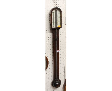 An early 19th century mahogany and inlaid stick barometer, having unsigned ivory scale and with further inset thermometer dia