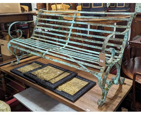 A Regency style painted iron strapwork three seater garden bench, having scroll end detail, length 153cmPossibly early 19th c