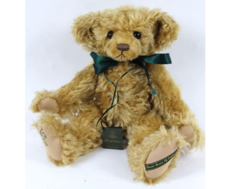 A Rachel Wintel Thread Bear plush jointed Teddy bear, Victor with green bow, 46cm high.