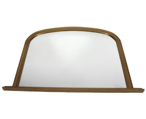 A Victorian style over mantel mirror, of D-end outline with overhanging base, and plain glass, 76cm H, 104cm W, 9cm D.