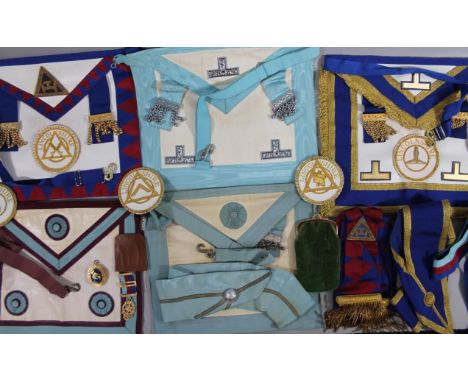 Various Masonic regalia, to include Lincolnshire badges, base metal medals, sash, apron, various other items, etc. in a black