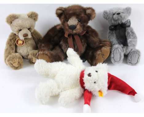 A late 20thC Steiff Teddy bear, in white, Charlie Bear grey Callum with bow, 29cm high, Ebbets bear and a further Charlie Bea