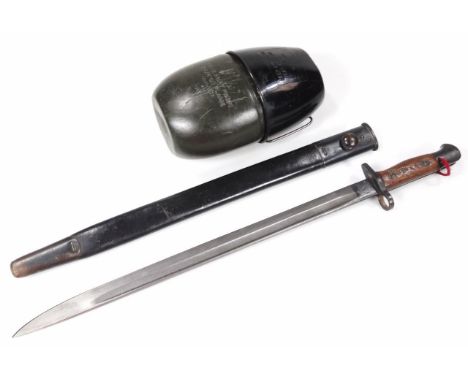 A 1907 G R Bayonet, with scabbard, shaped blade and partial wooden handle, initialled C, 58cm wide, and a water canteen with 