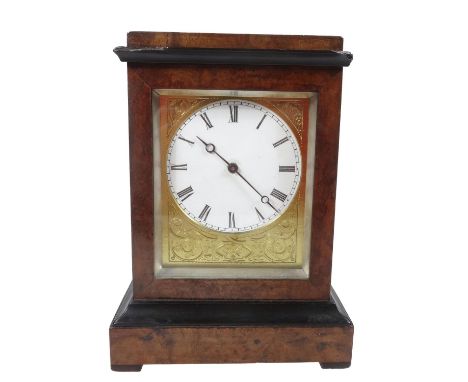 A late 19thC burr walnut ebonised cased mantel clock, the 7cm dia. Roman numeric dial fronting a gold plated back plate, and 