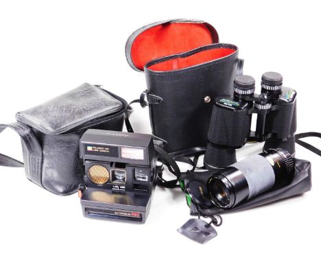 Various camera equipment, a Miranda lens, 75-300mm 1:4.5-5.6, (when closed) 16cm wide, in outer pouch, a Polaroid camera with