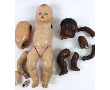 An early 20thC German bisque baby doll's head, by Armand Marseille, the head 12cm high, with fixed eyes, closed mouth, variou