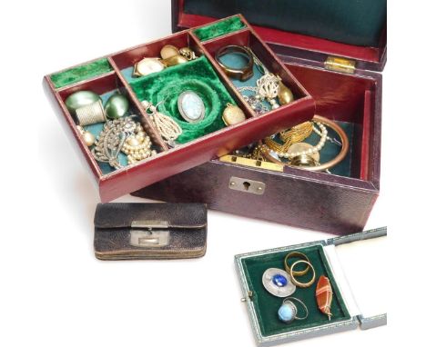 A pressed leather jewellery casket, of domed top outline, containing a quantity of various jewellery, bracelets, bangle, 8cm 