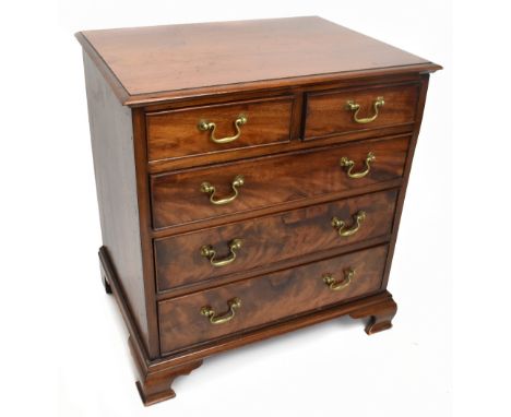 A mahogany chest of two short over three long drawers of small proportions on bracket feet, width 62cm, depth 45cm, height 86