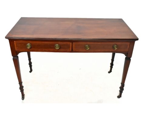 An Edwardian mahogany two drawer side table, with brass ring loop handles and tapered legs, height 76cm, width 114cm, depth 5