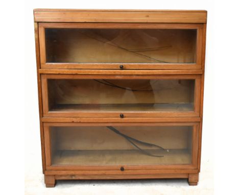 A Globe Wernicke style light oak three section bookcase on block feet, height 100cm, width 86cm, depth 29cm.Additional Inform