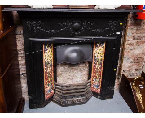 BLACK CAST FIREPLACE WITH TILE INSERT